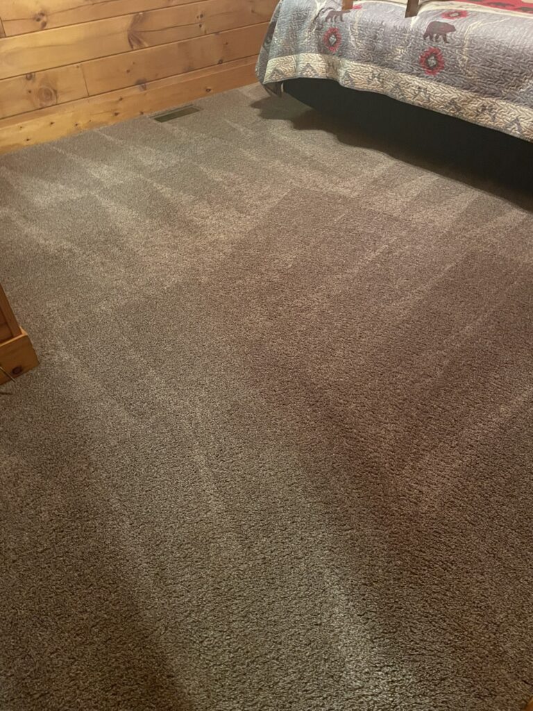 Deep cleaning cabin carpet in Sevierville — removing heavy soil from short-term rental property
