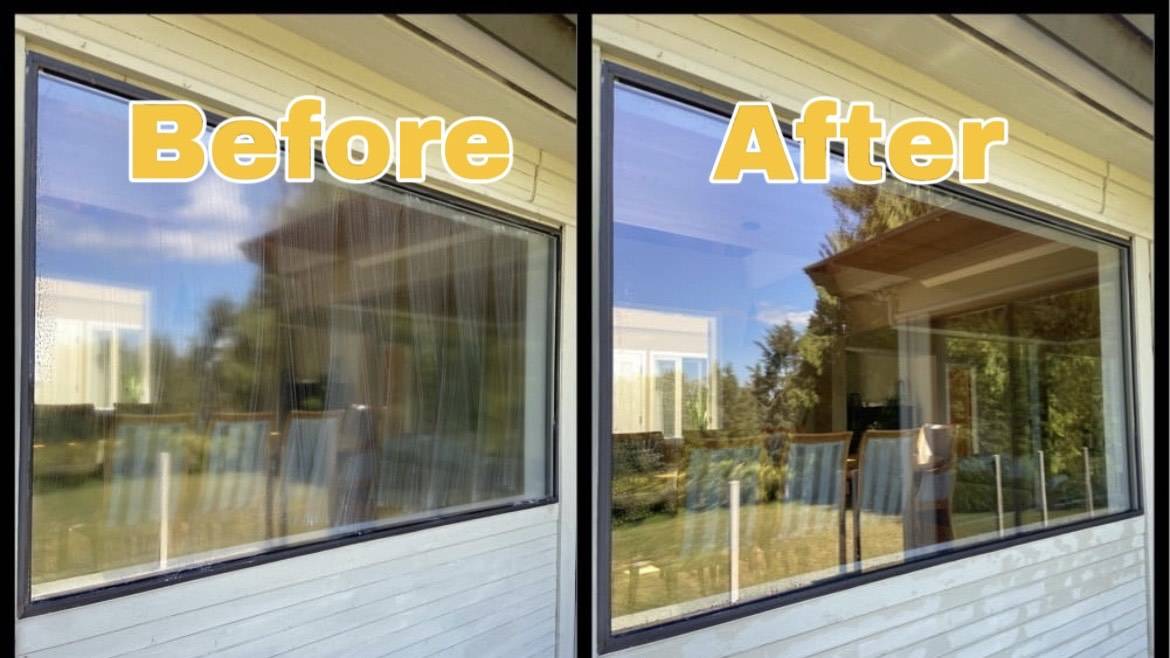 Window screen and glass cleaned for full visibility through large residential window in Sevierville.