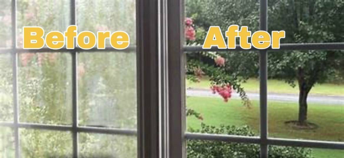 Large cabin window cleaned to restore bright lake view through clear glass.
